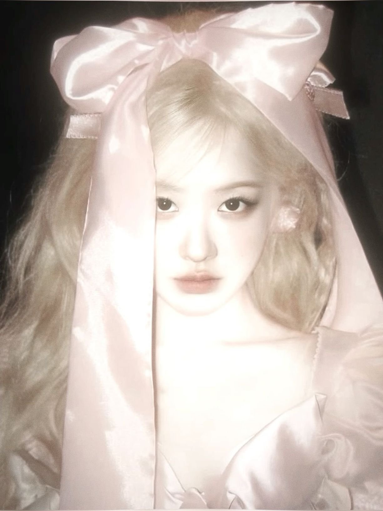 Pastel coquette girl pfp with pearl ribbon details for aesthetic Instagram and Pinterest avatars