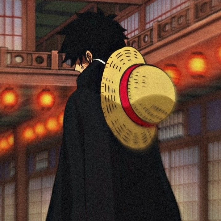 Cool luffy pfp in night city rain with neon reflections suited for steam and discord gaming