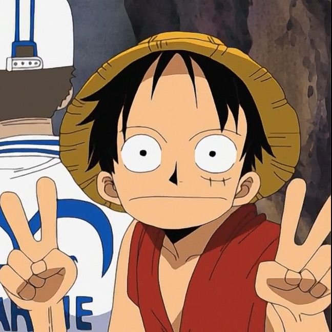 Cute luffy pfp making little finger heart surrounded by cherry blossoms ideal for TikTok edits