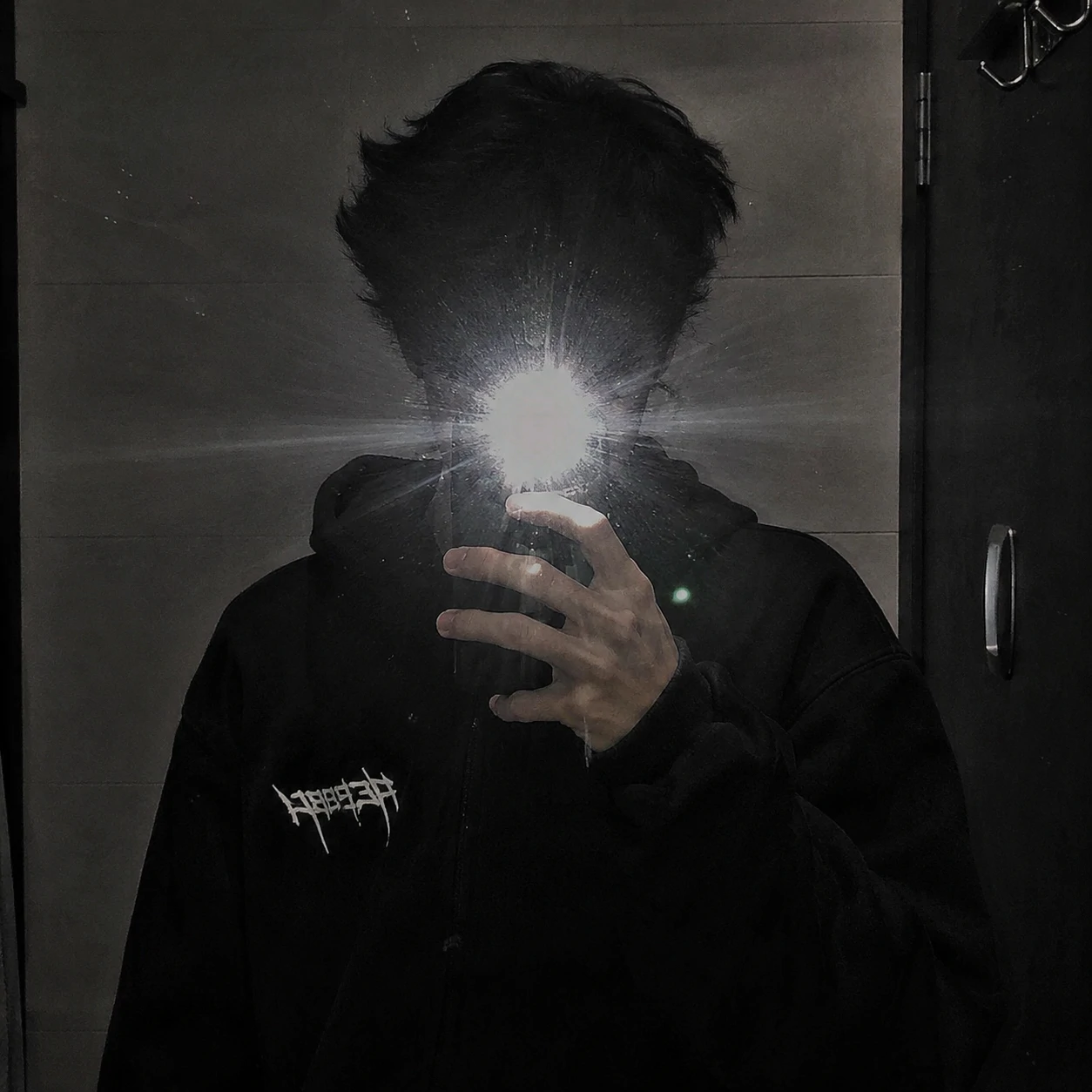 Mirror flash covering face in an unknown boy pfp.