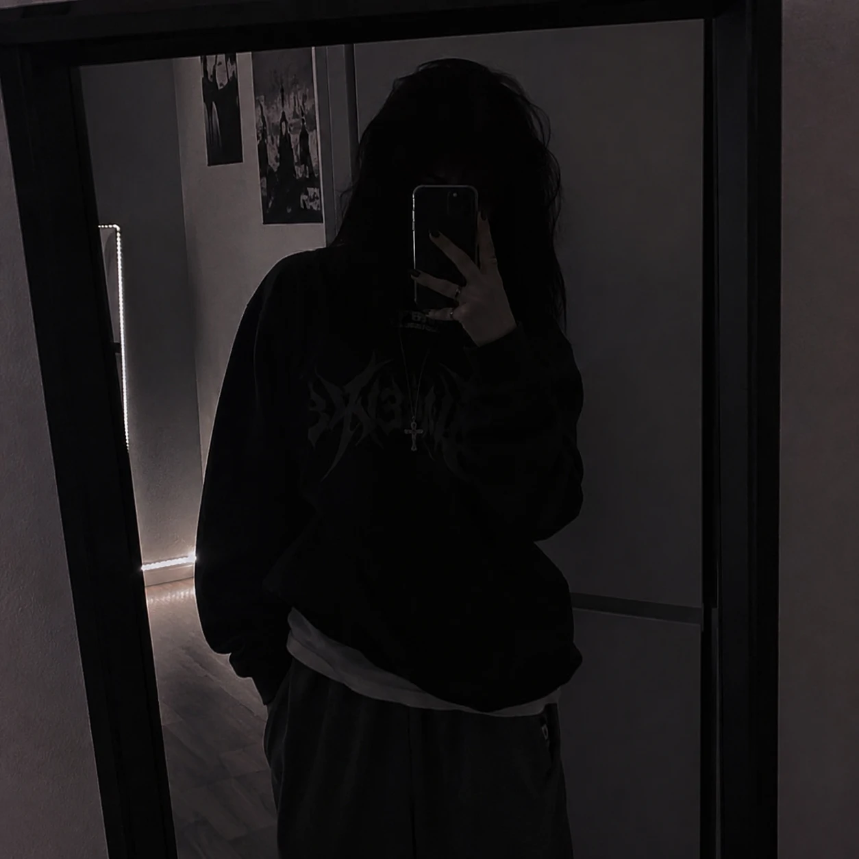 Shadowed mirror selfie with hidden face for an aesthetic unknown pfp.